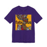 A purple short-sleeve t-shirt featuring an Afrocentric Black woman with a large graphic print on the front with the word 'fabulous' in dark brown text over a collage of colorful objects.