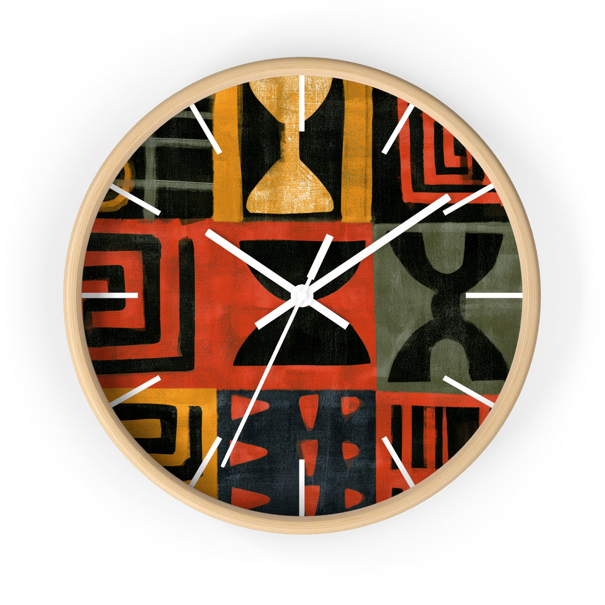 White Afrocentric abstract geometric round wall clock with white time markings and white clock hands, featuring African-inspired symbols, spirals, arches, stripes, and graphic patterns in red, black, mustard gold, charcoal, and earthy gray, displayed against a white background.