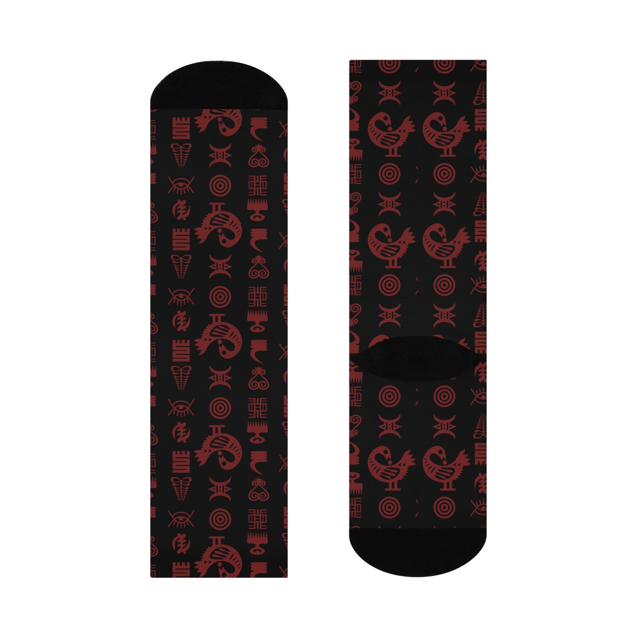 Crew socks featuring traditional Ghanaian Adinkra symbols in an Afrocentric pattern representing wisdom, strength, unity, perseverance, and African cultural heritage.
