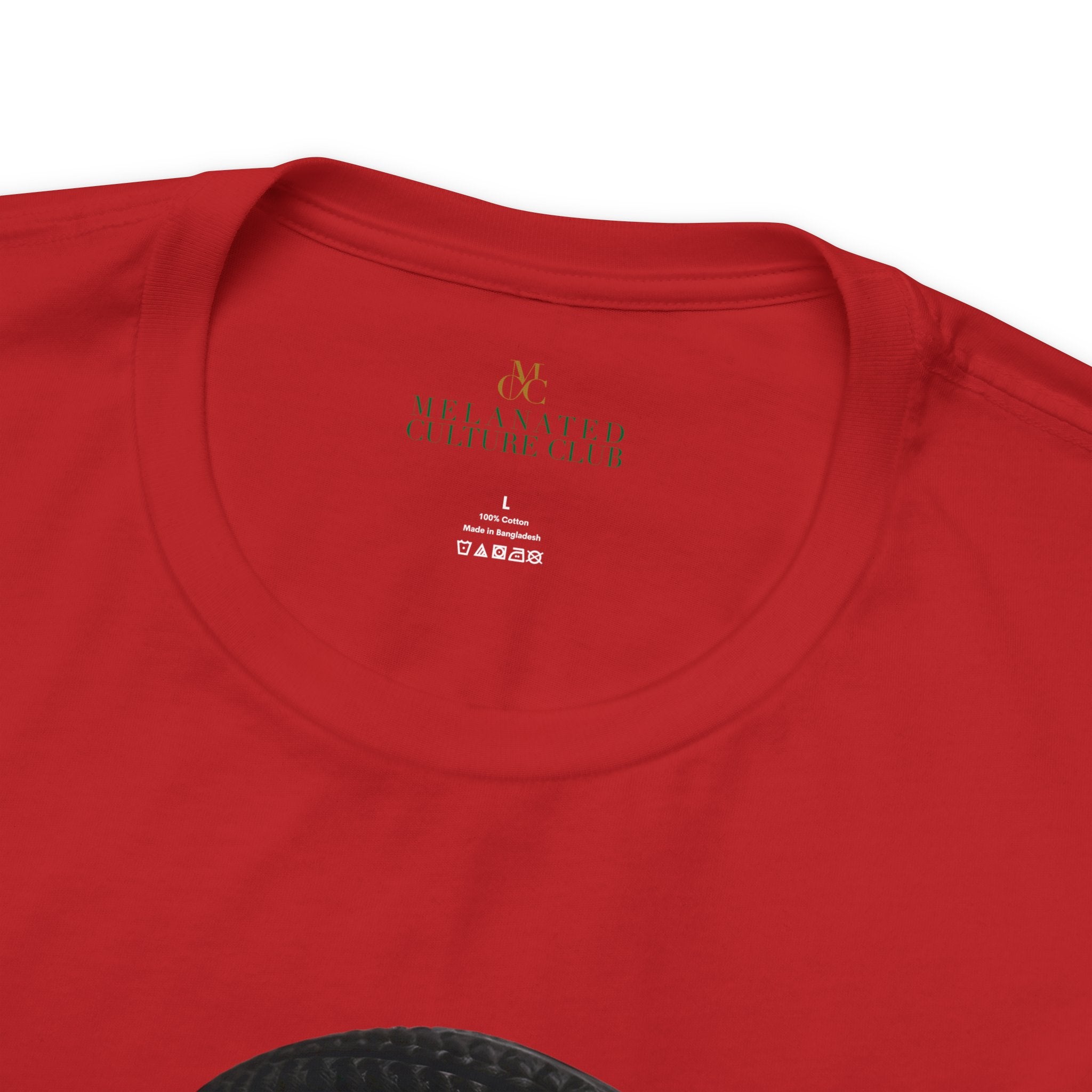 Inside logo label on Afrocentric Black Beauty tee shirt in red.