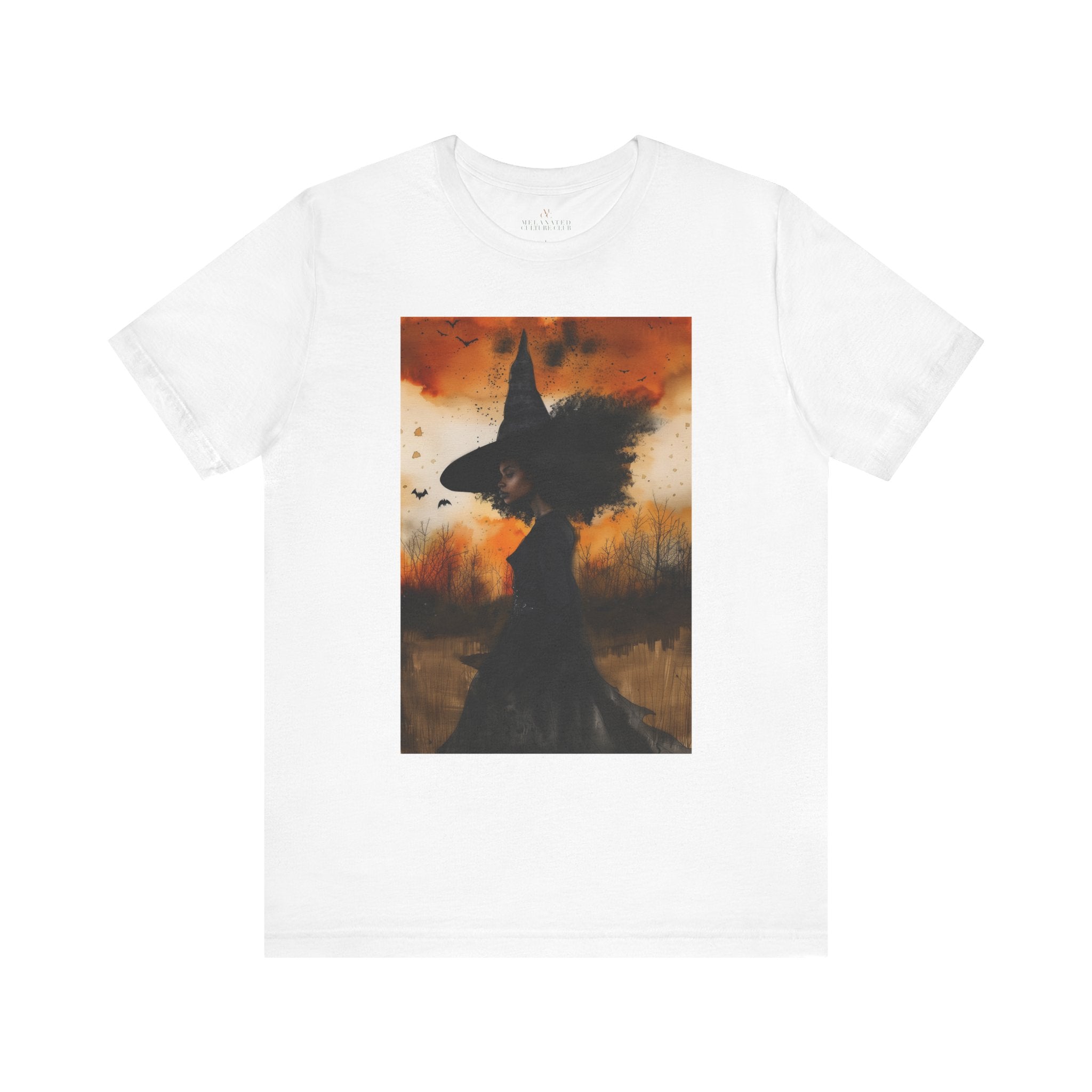Afrocentric Black Witch T-Shirt featuring a watercolor illustration of an African American witch with black bats flying across a dark moody background. Unisex Halloween graphic tee with Afrocentric gothic design.