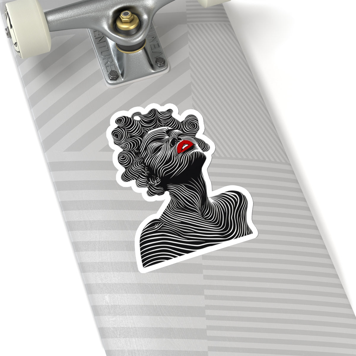 White edge Bantu Knots sticker on skateboard.
