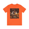 Black Male Student Tee Shirt in orange.