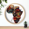 Light wood round wall clock featuring a digitally-generated African mask in the shape of the map of Africa.