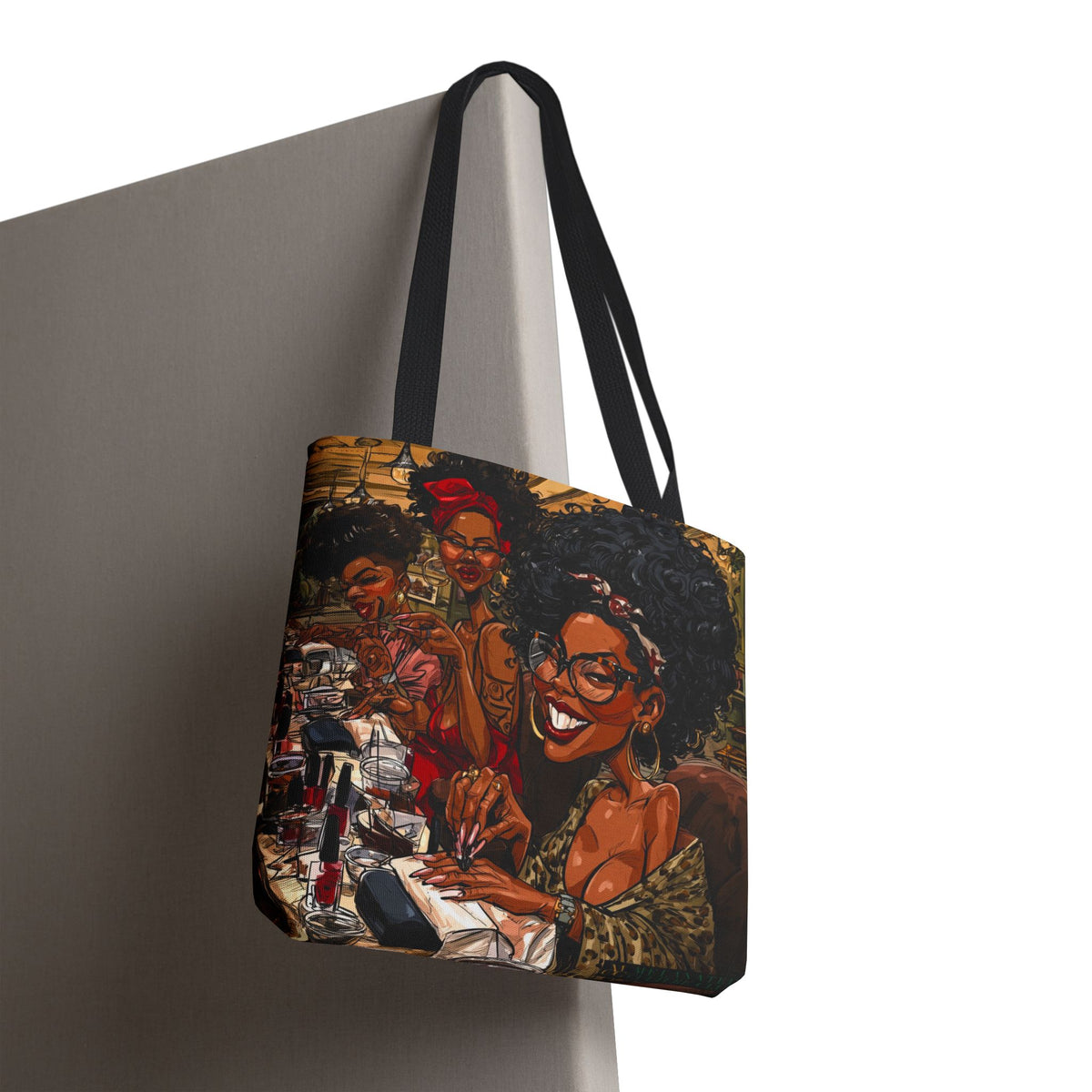 Black Women Nail Salon tote bag featuring colorful artwork of stylish Black women getting manicures together with nail polish and beauty accessories.