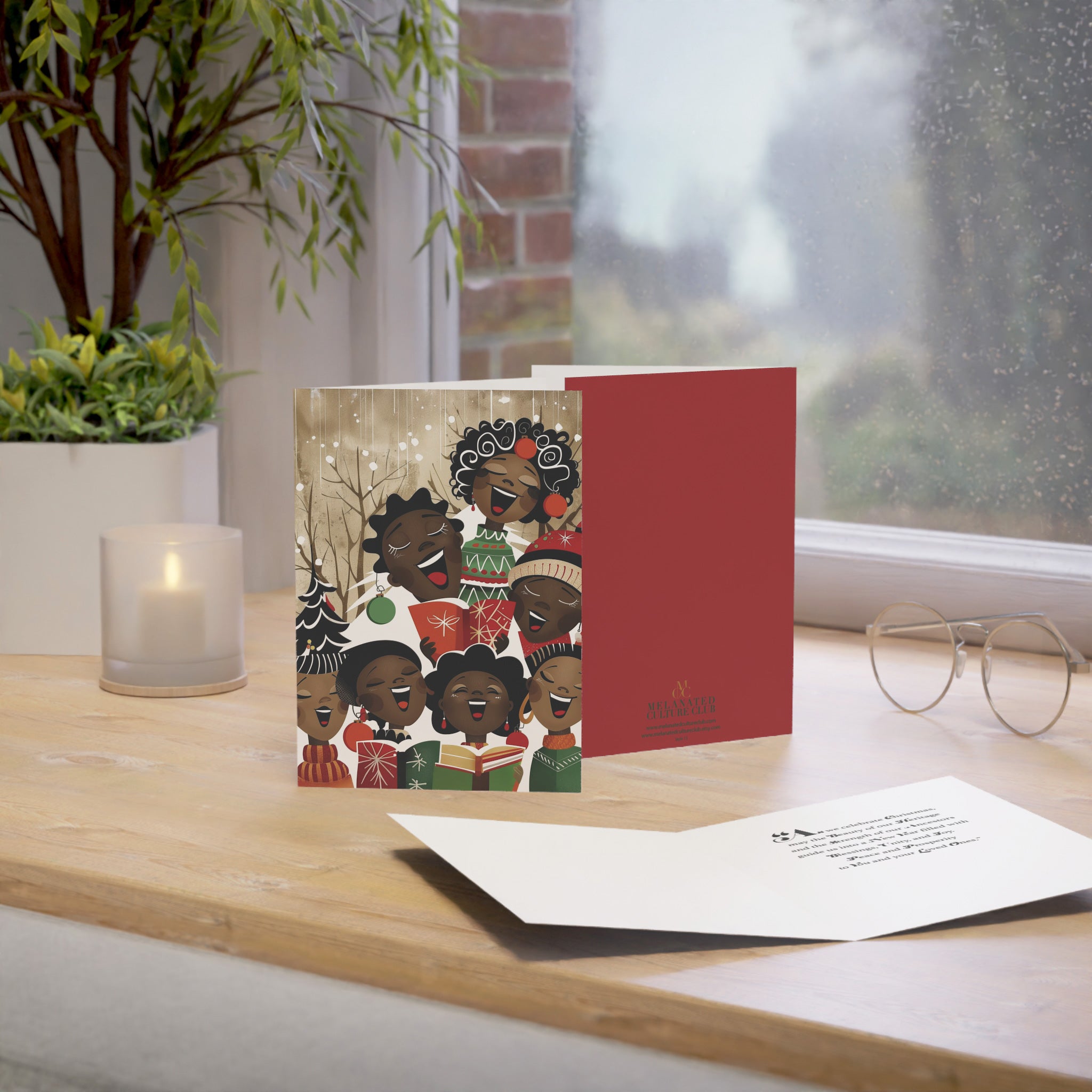 Christmas cards featuring African American holiday carolers and Black church choir singers in festive attire, available as a single card or boxed set with white envelopes.