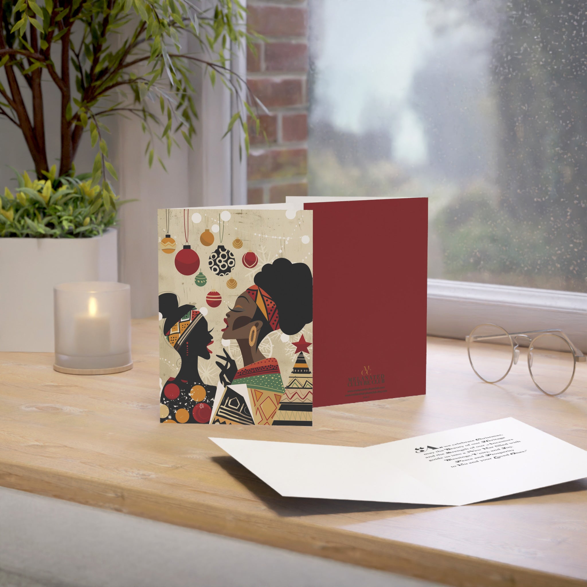 African American Women Christmas Carolers Greeting Card featuring Afrocentric holiday artwork of Black women singing Christmas carols in vibrant seasonal colors.