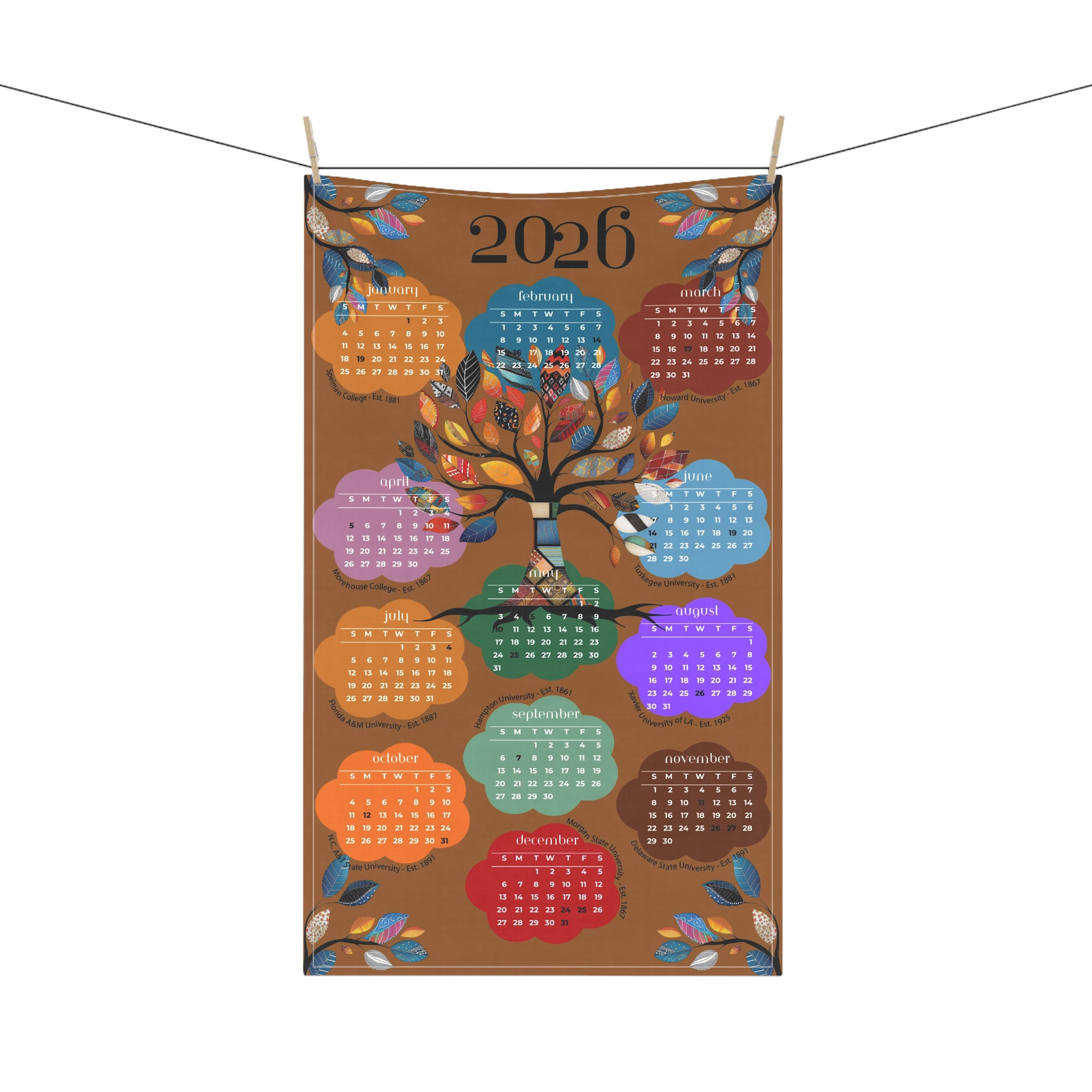 2026 Tea Towel Calendar featuring an abstract Tree of Life design with the names of the Top 10 HBCUs. Afrocentric kitchen decor and African American heritage gift.