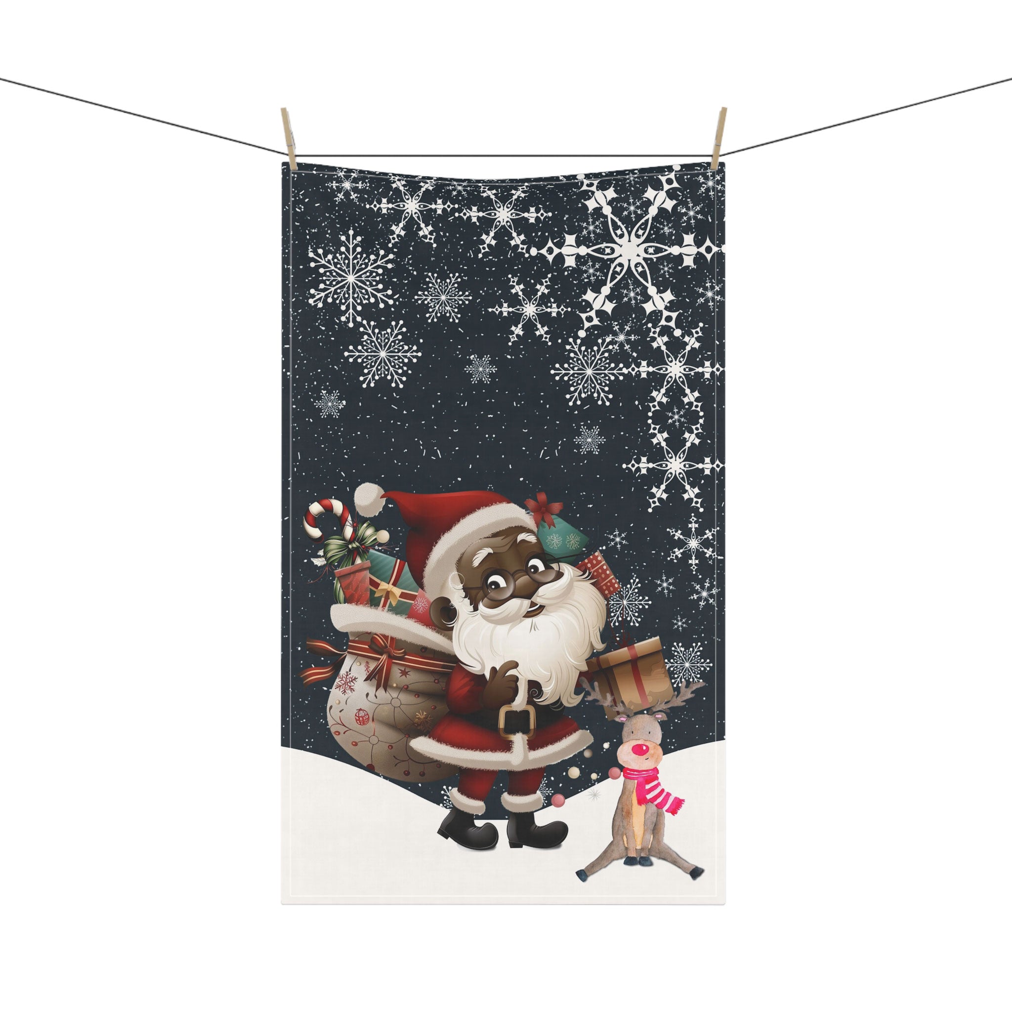 Black Santa and Reindeer Tea Towel with large snowflakes and falling snow – Afrocentric holiday kitchen decor.