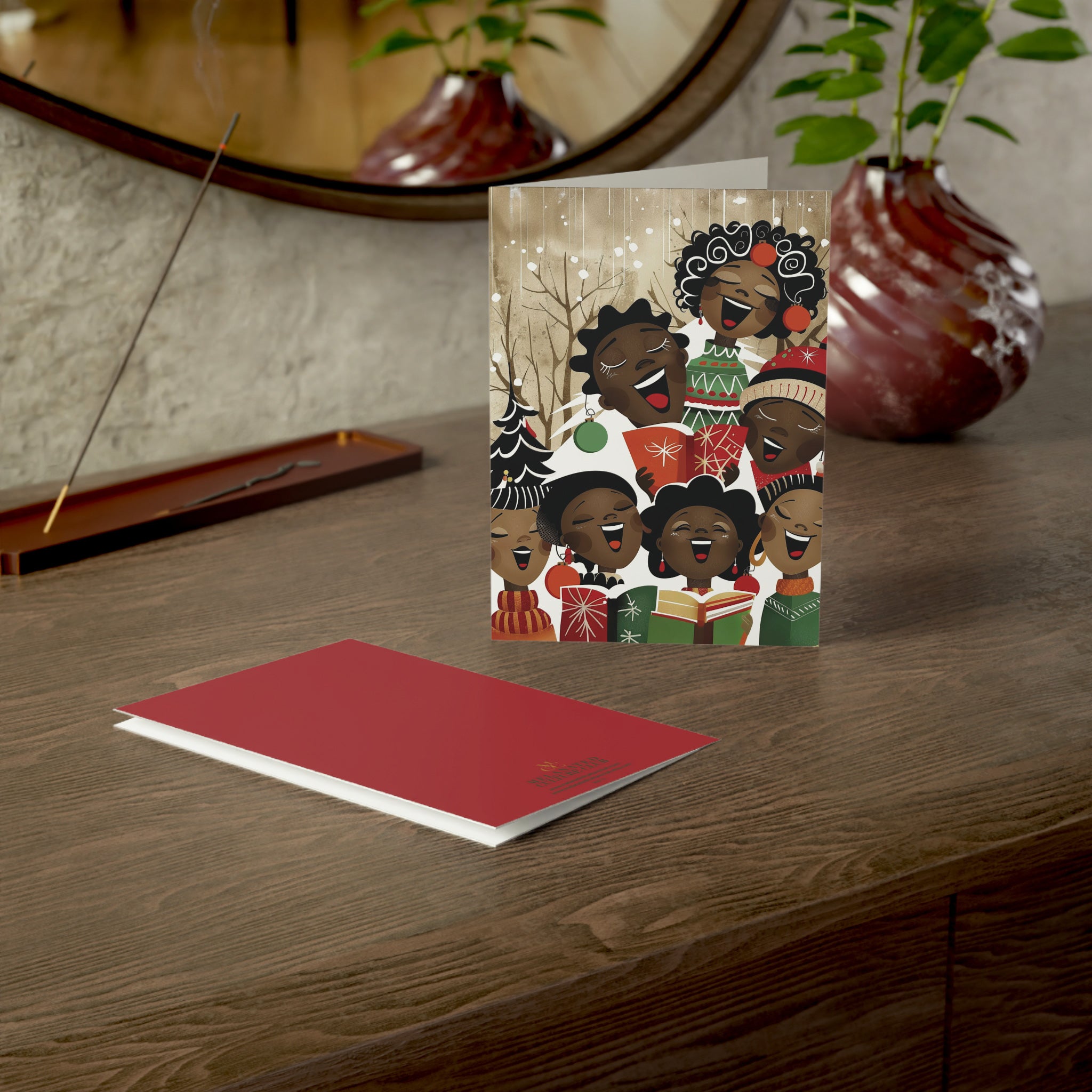 Christmas cards featuring African American holiday carolers and Black church choir singers in festive attire, available as a single card or boxed set with white envelopes.