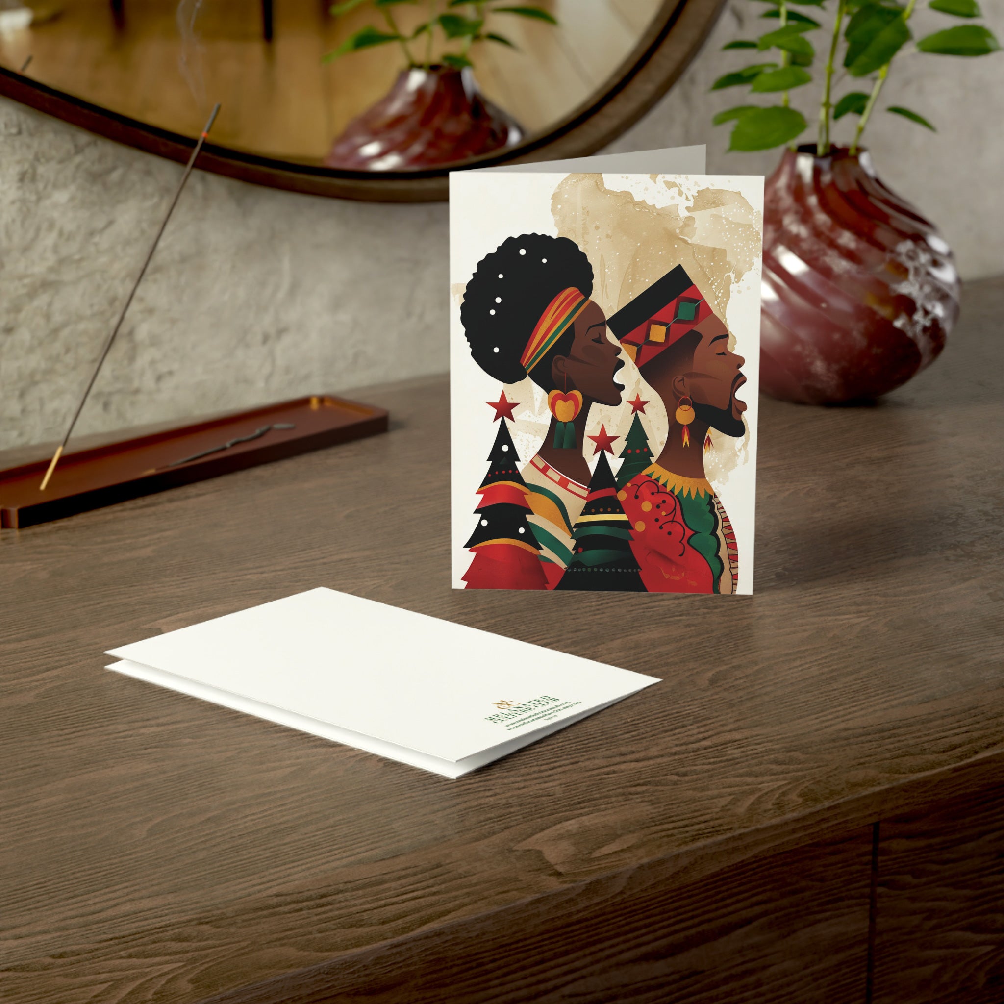 African American Couple Christmas Card featuring a Black man and woman dressed in traditional African clothing, holiday greeting card with envelopes.