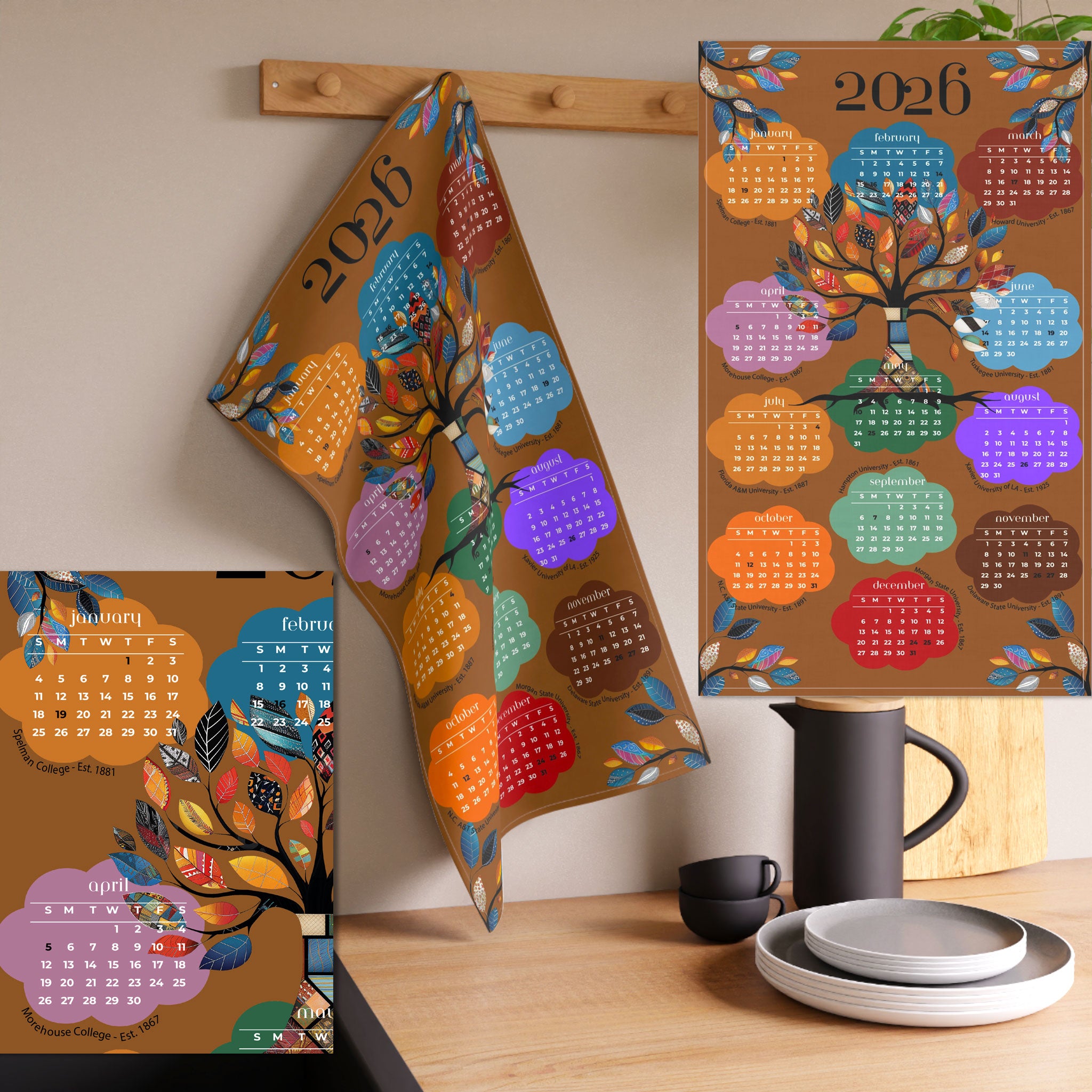 2026 Tea Towel Calendar featuring an abstract Tree of Life design with the names of the Top 10 HBCUs. Afrocentric kitchen decor and African American heritage gift.