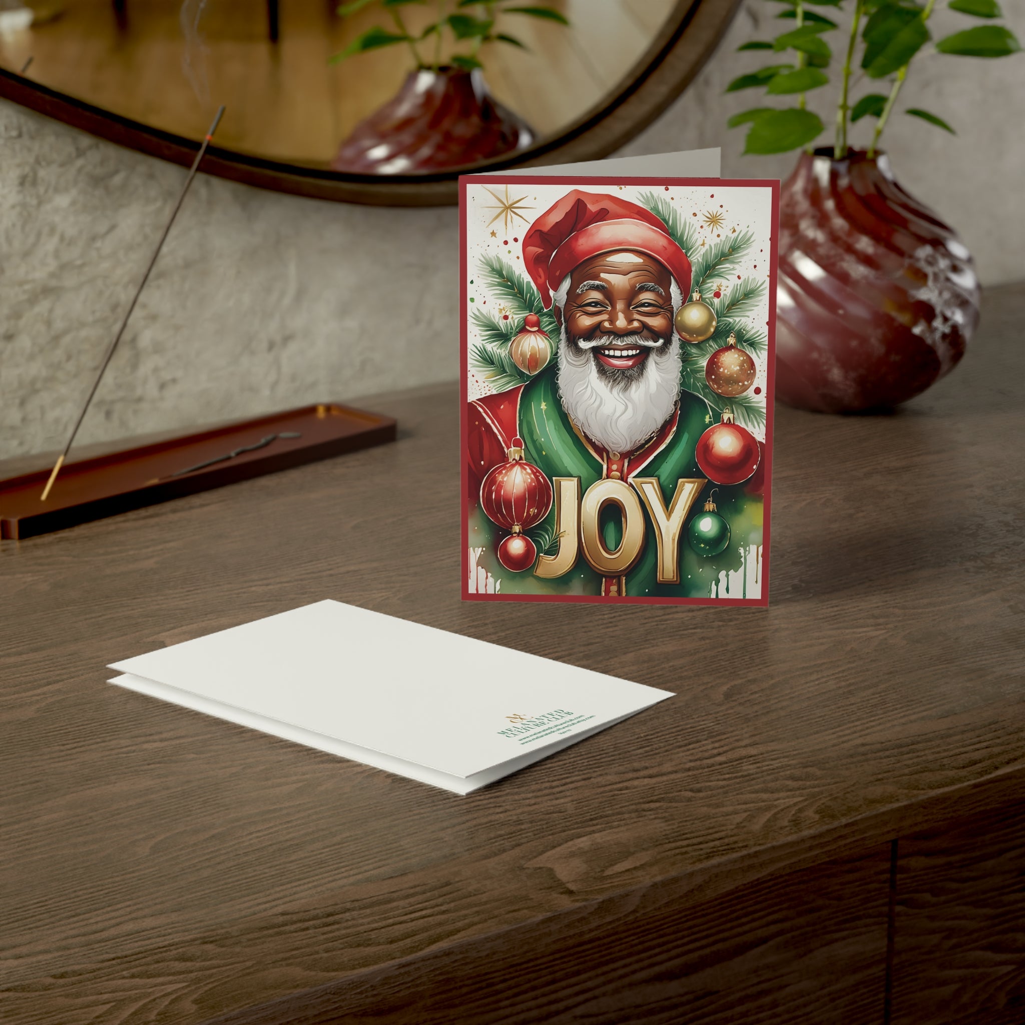 Black Santa Christmas Card with the word “JOY,” featuring an African American Santa Claus design, festive Afrocentric holiday greeting card with envelope.