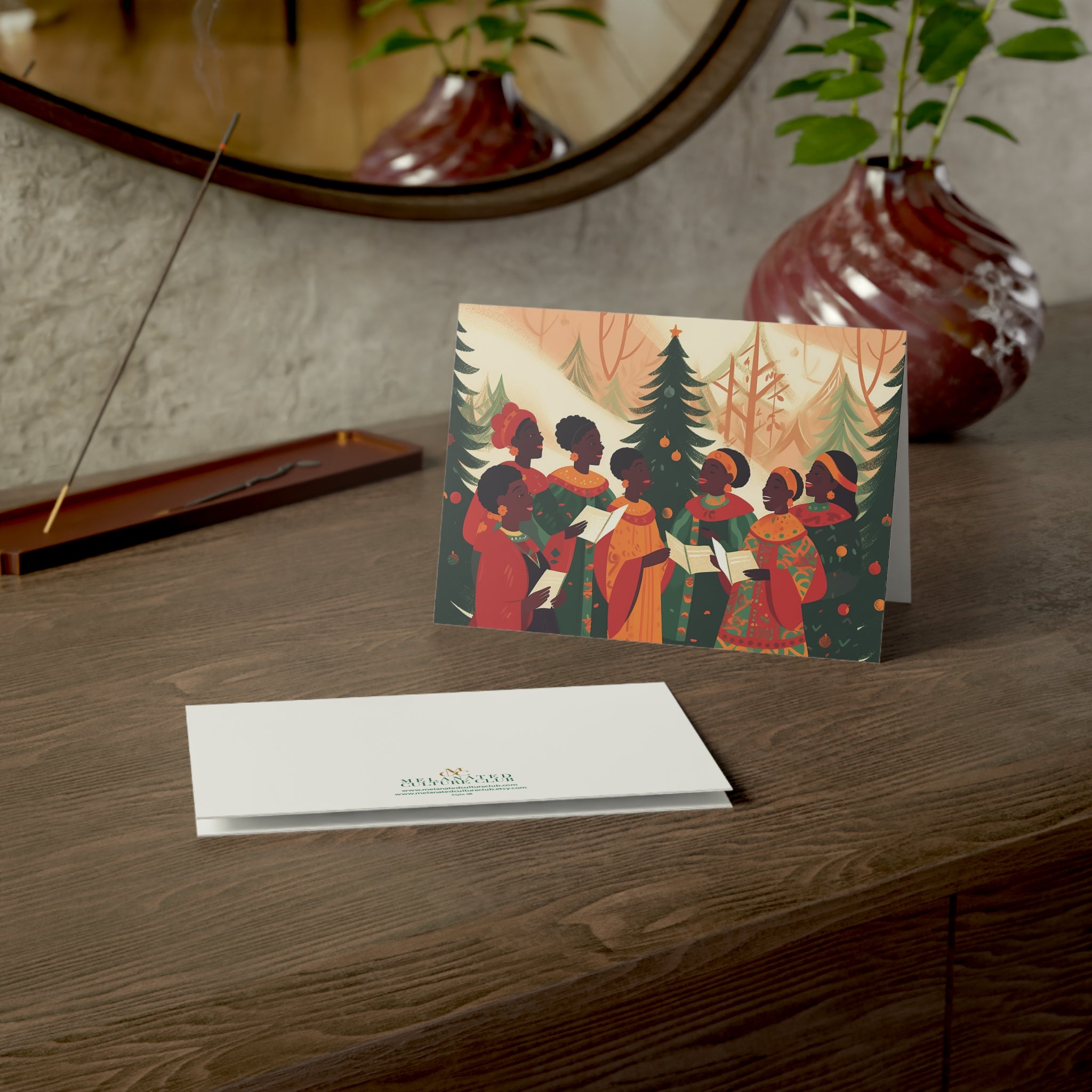 Christmas cards featuring African American holiday carolers and Black church choir singers in festive attire, available as a single card or boxed set with white envelopes.
