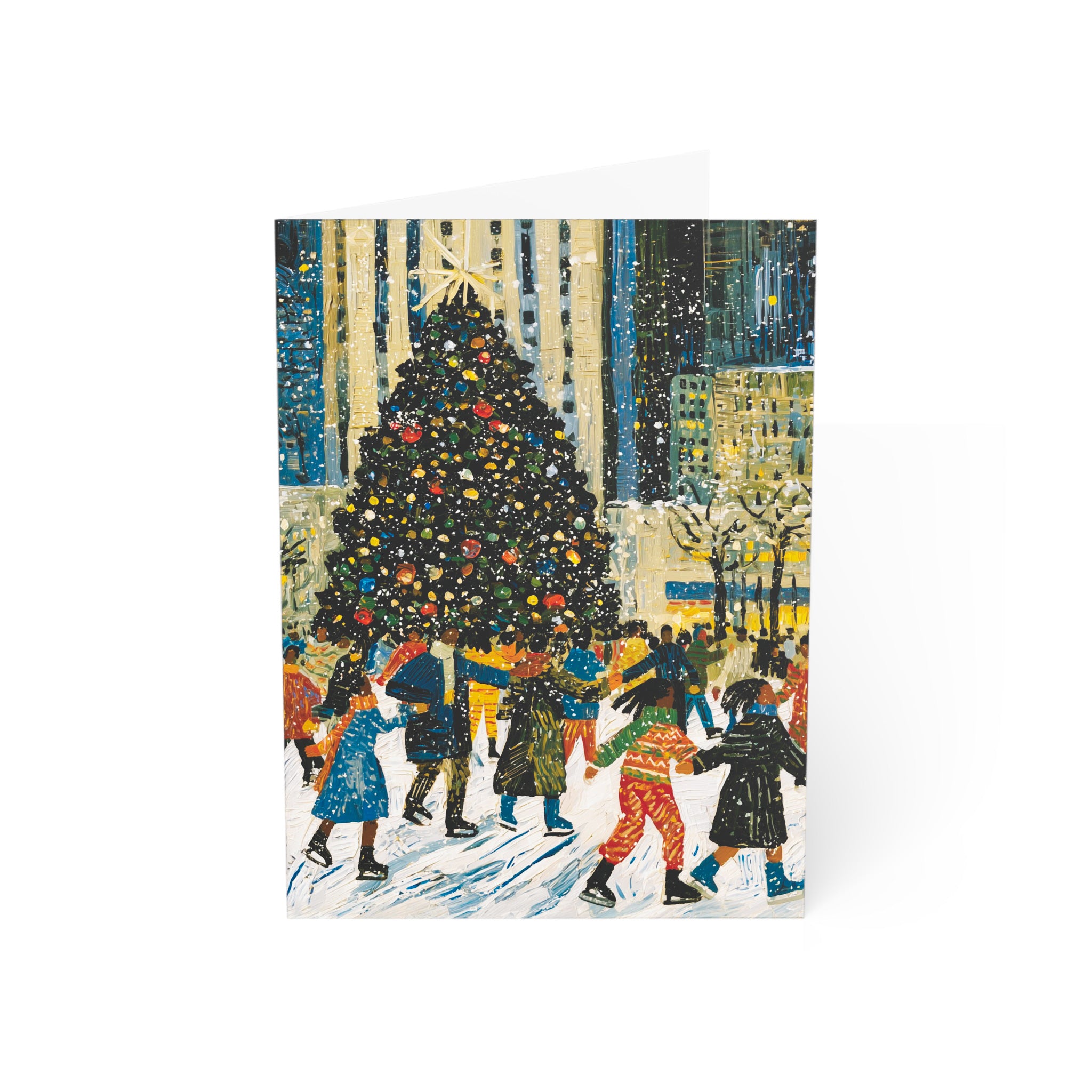 A folded Christmas greeting card featuring a colorful winter city scene with a decorated Christmas tree and Black children ice skating at the Rockefeller Center in New York, shown against a plain white background.