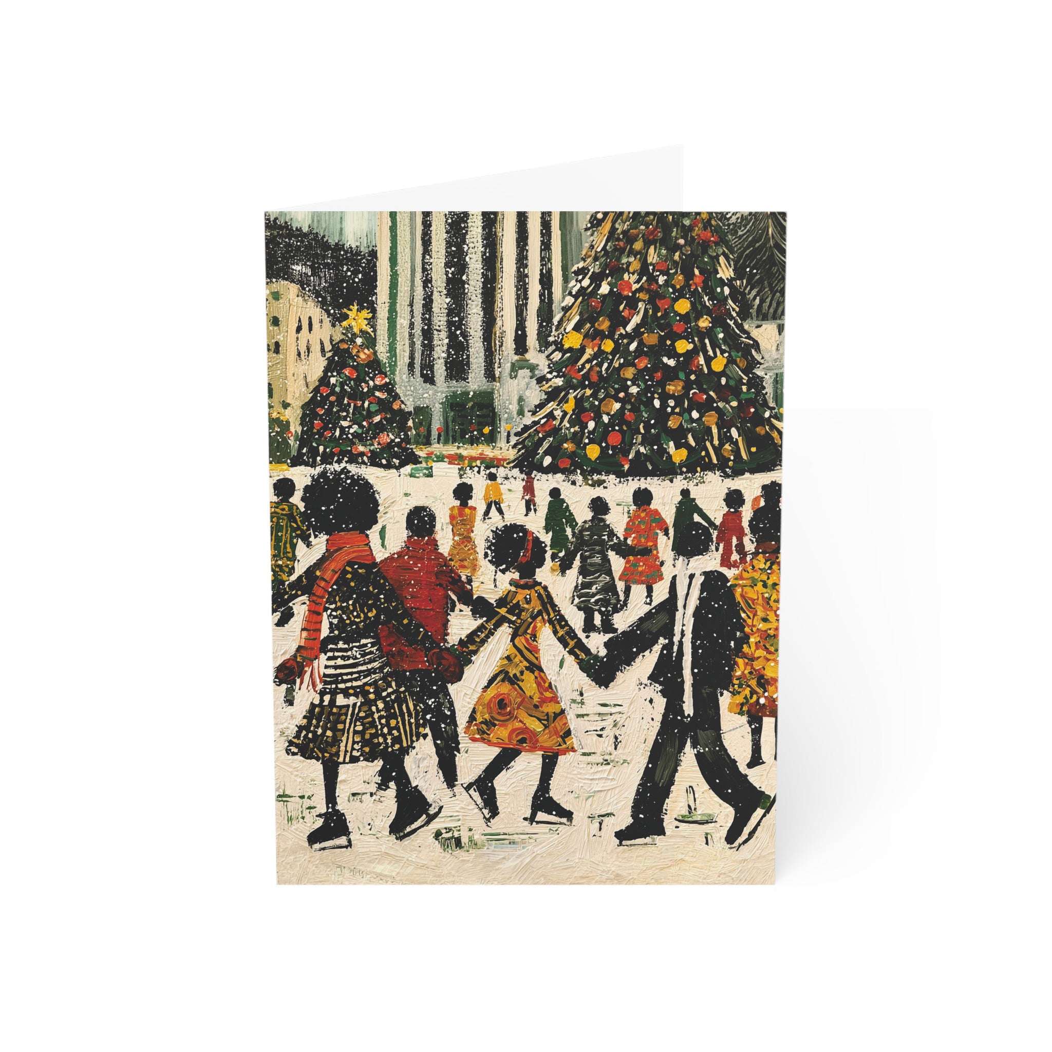 A 5x7 greeting card featuring a textured, folk-art style illustration of Black people ice skating at the Rockefeller Center in New York City in the snow around Christmas trees, shown standing upright on a white background.