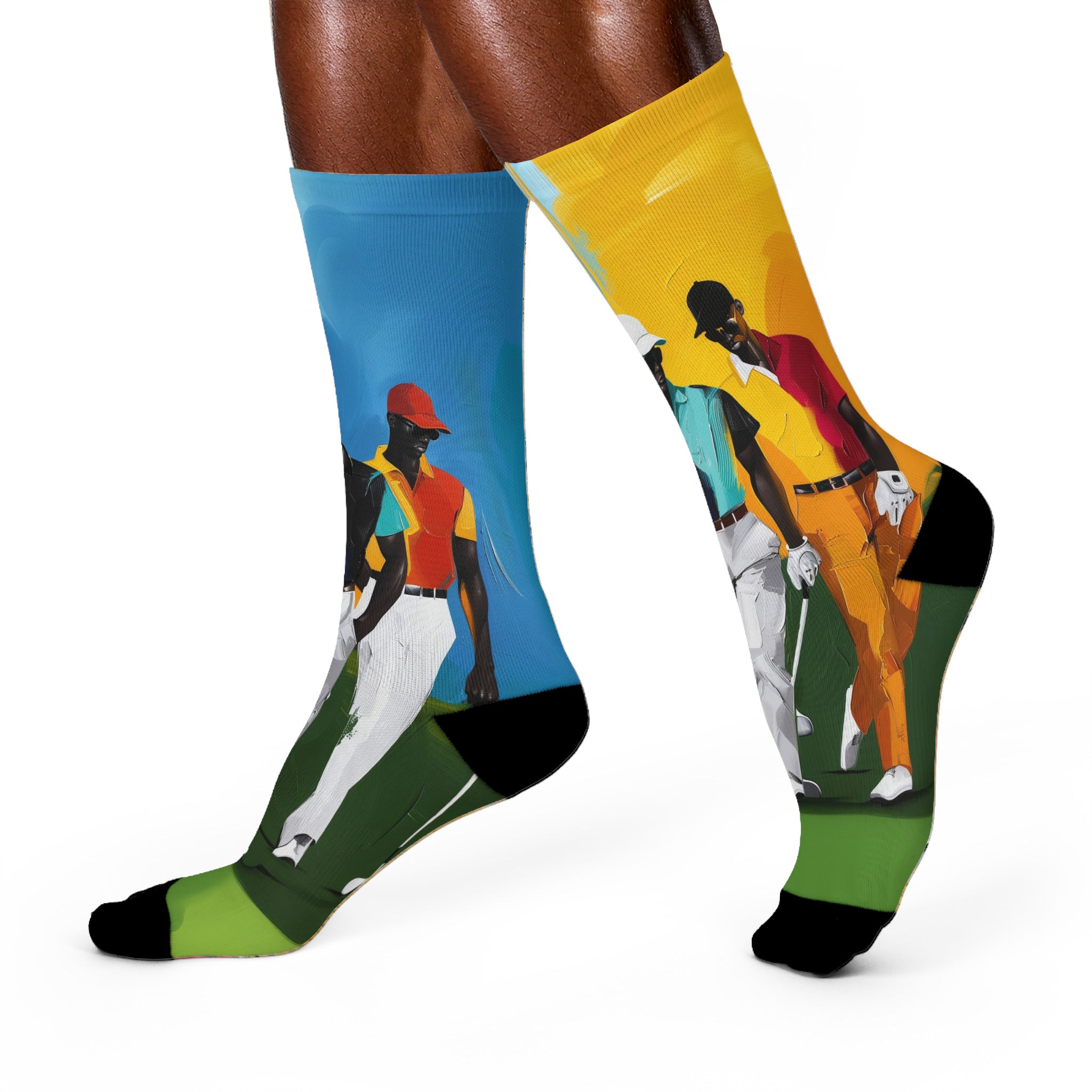 White crew socks featuring Afrocentric painterly artwork of Black men playing golf on a vibrant green course, celebrating Black joy, leisure, and stylish golf culture.