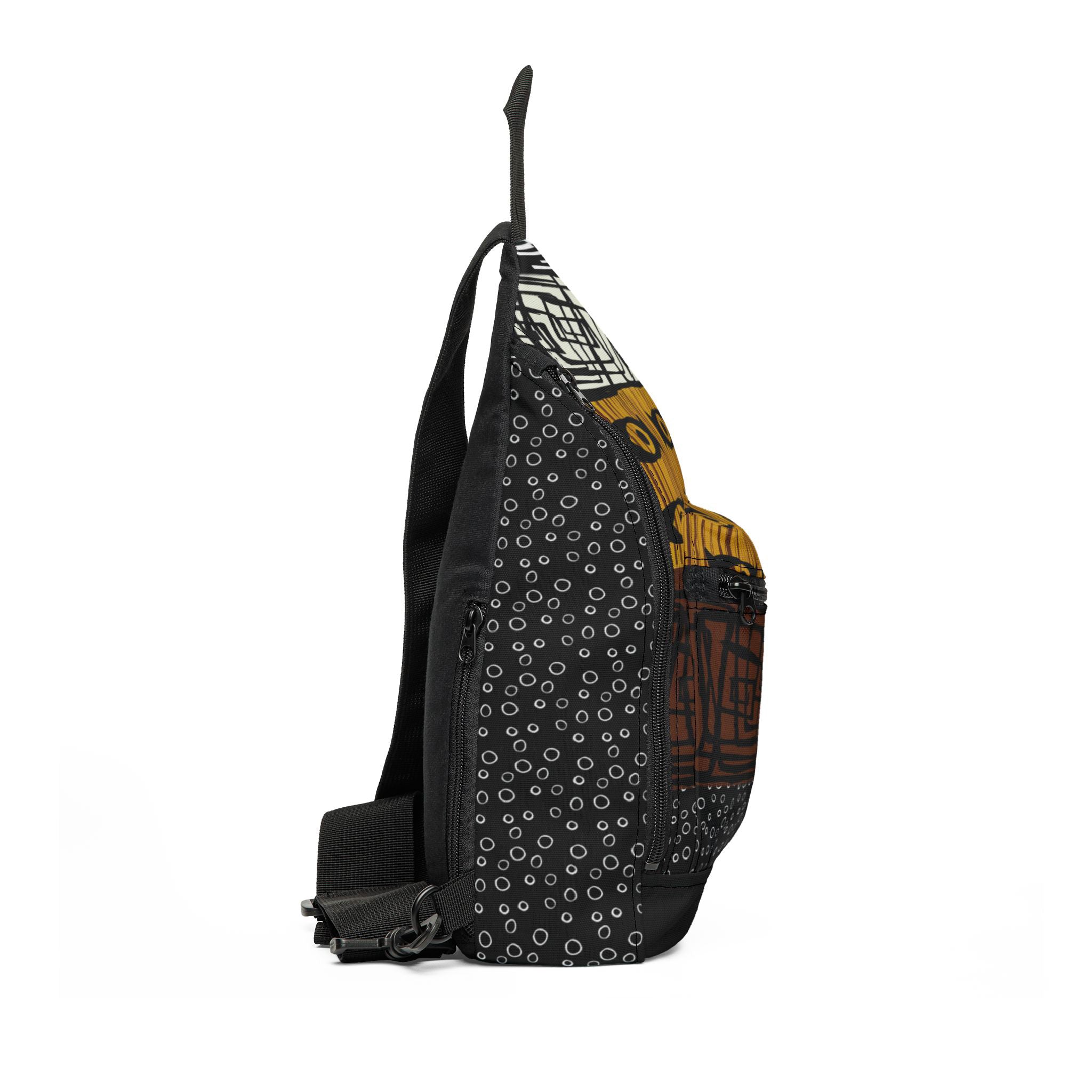 Mud cloth pattern crossbody sling bag featuring traditional African-inspired geometric designs in black and white, stylish Afrocentric travel accessory for everyday use.