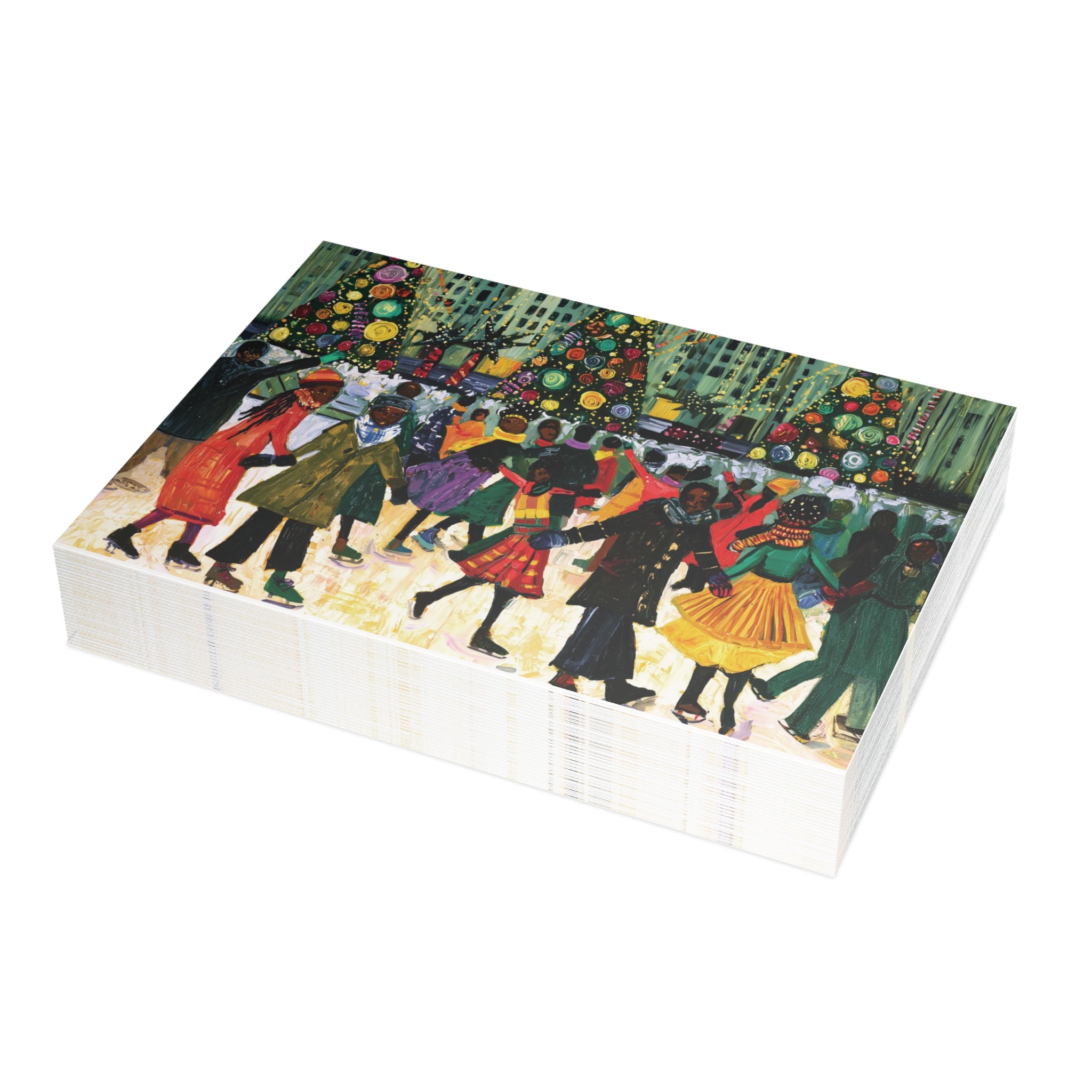 Stack of Christmas greeting cards featuring a textured, folk-art style illustration of Black people ice skating at the Rockefeller Center in New York City in the snow around Christmas trees, shown standing upright on a white background.  Qty 30.