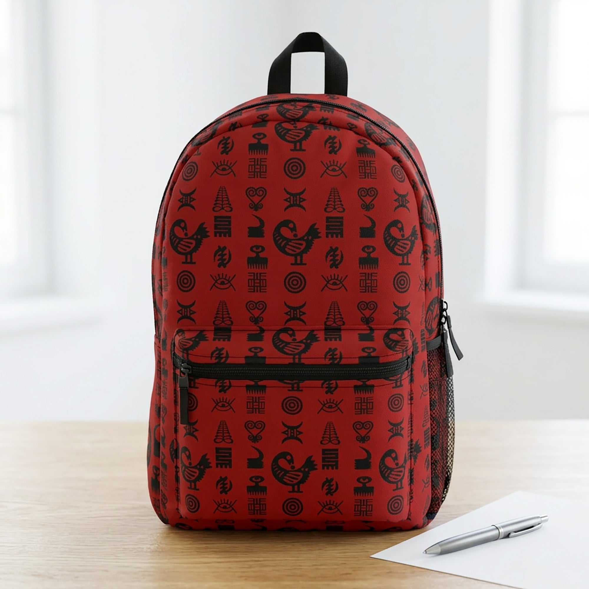 Backpack for school and travel featuring traditional Ghanaian Adinkra symbols in an Afrocentric pattern celebrating African heritage, culture, wisdom, and unity.