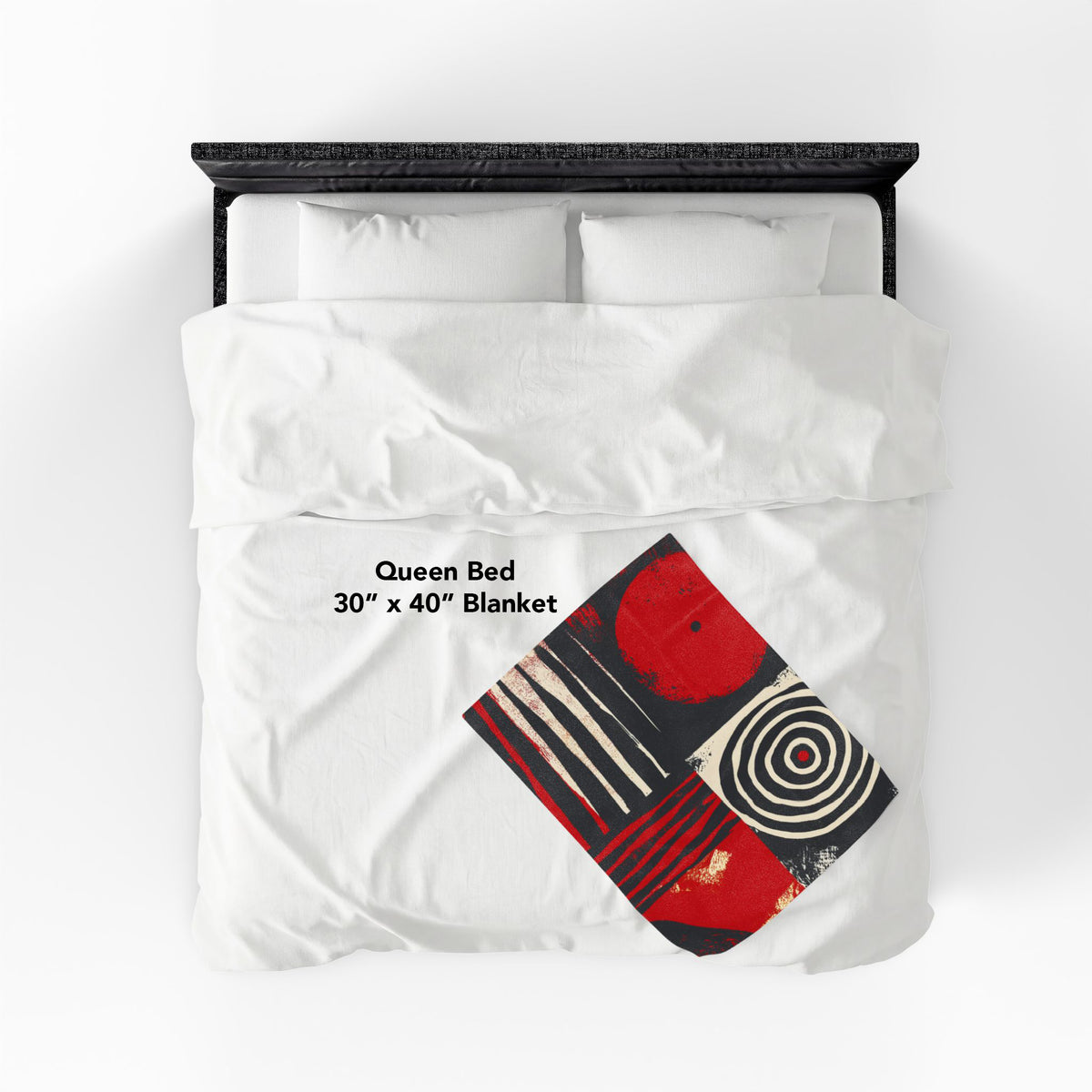 Full view of 30" x 40" Afrocentric geometric art throw blanket featuring bold black, red, gold, cream, and neutral abstract patterns with circles, spirals, grids, and textured African-inspired geometric shapes, laying over a queen size bed with white bed linen.