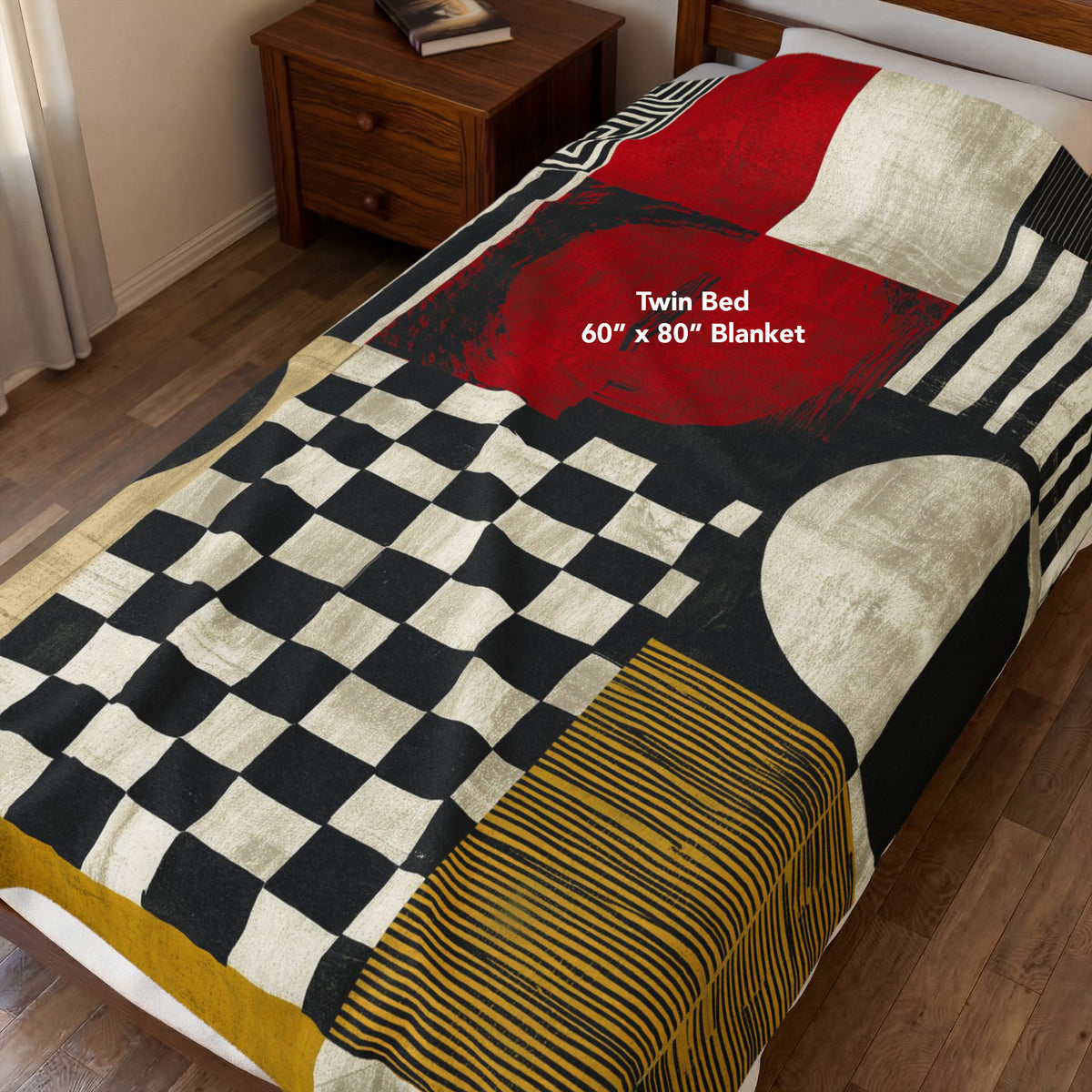 Afrocentric geometric art throw blanket featuring bold black, red, gold, cream, and neutral abstract patterns with circles, spirals, grids, and textured African-inspired geometric shapes, covering a twin size bed.