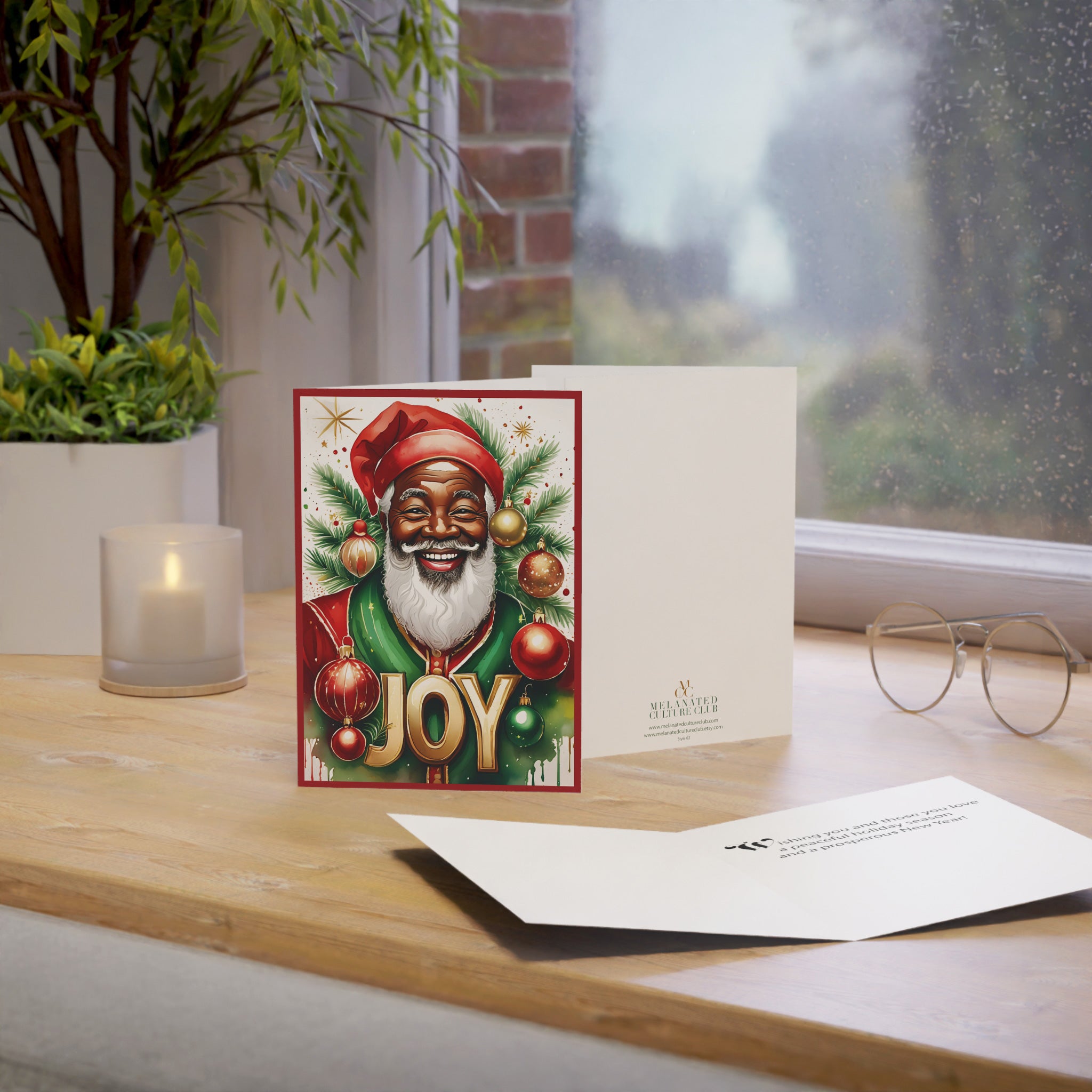 Black Santa Christmas Card with the word “JOY,” featuring an African American Santa Claus design, festive Afrocentric holiday greeting card with envelope.