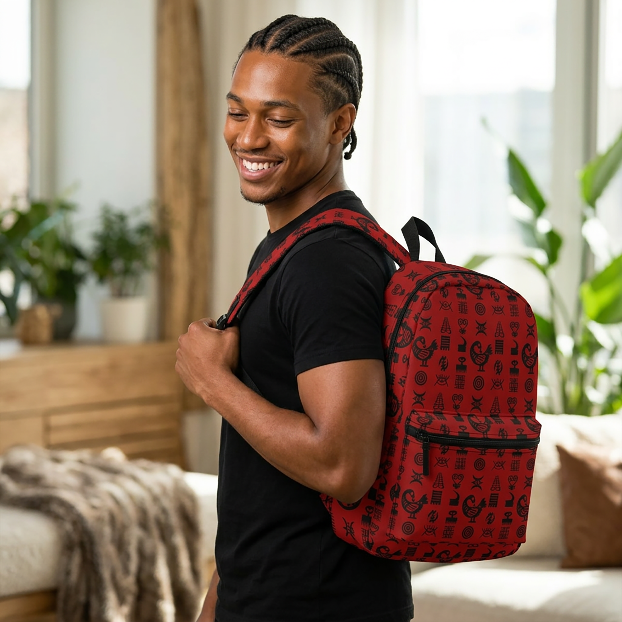 Backpack for school and travel featuring traditional Ghanaian Adinkra symbols in an Afrocentric pattern celebrating African heritage, culture, wisdom, and unity.