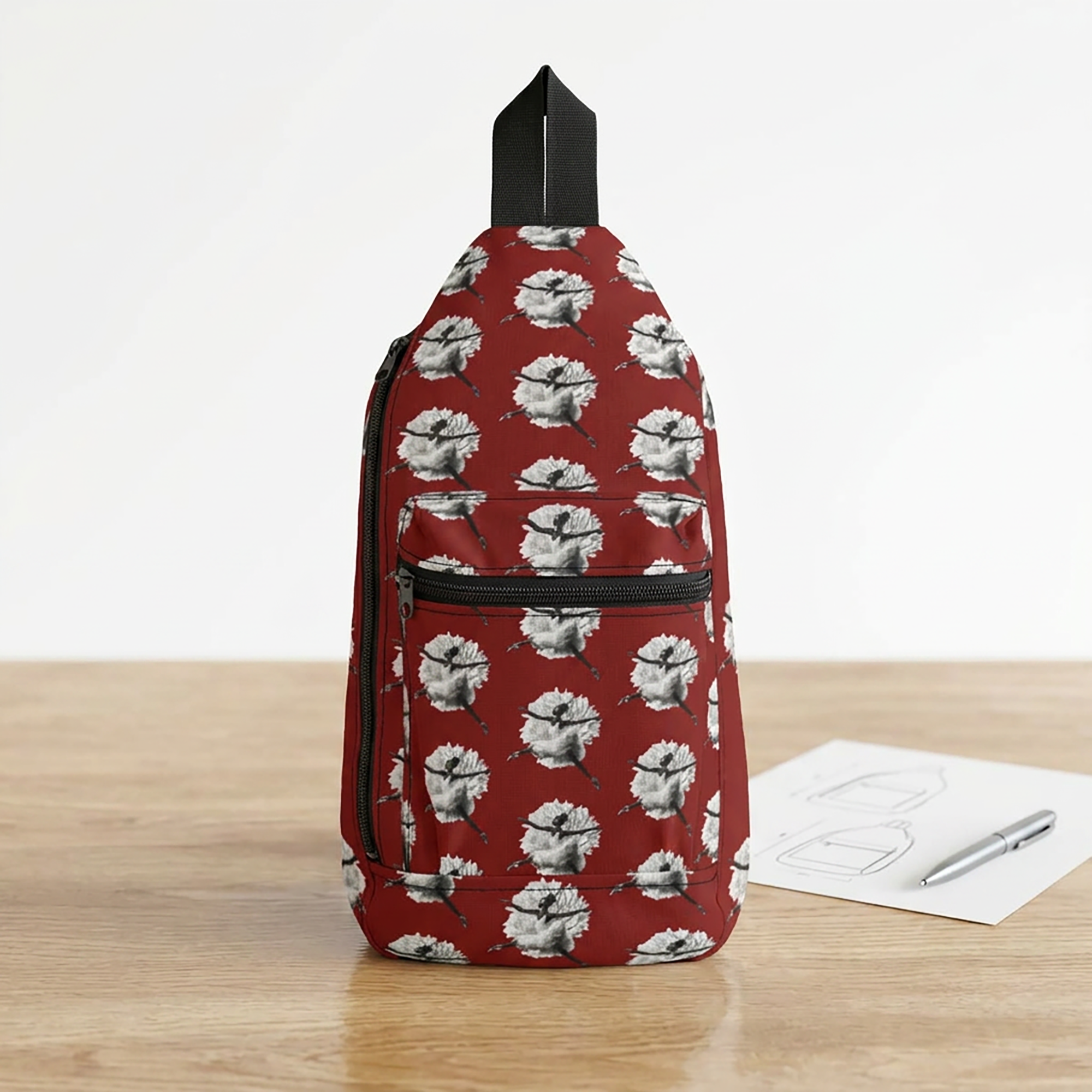 Crossbody sling bag featuring a graceful Black girl ballerina wearing a white tutu and ballet slippers in an elegant dance pose, celebrating ballet and African American representation.
