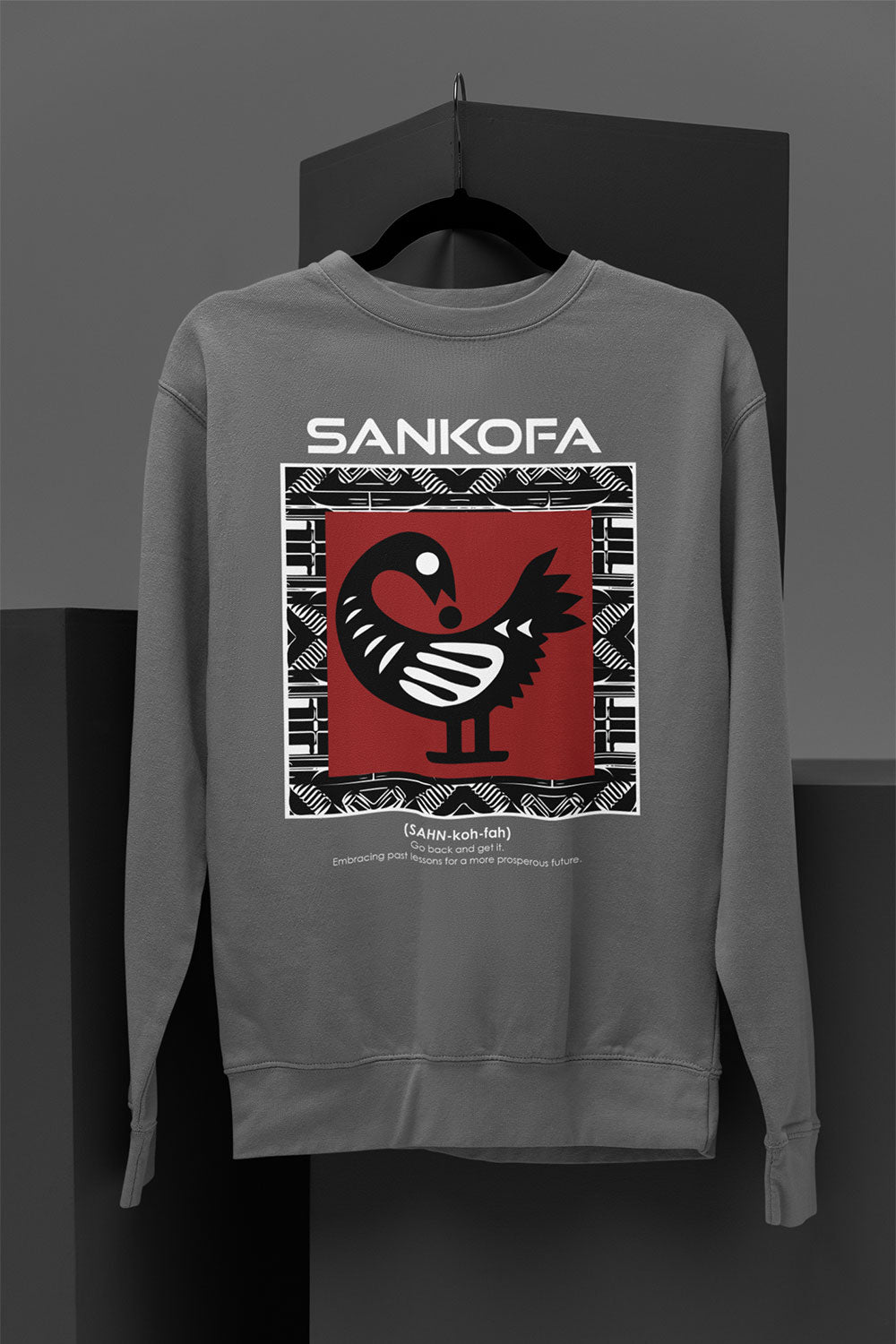 Adinkra Sankofa Sweatshirt with Ghana’s iconic bird symbol and cultural definition. Afrocentric unisex pullover celebrating African heritage, history, and Black pride.