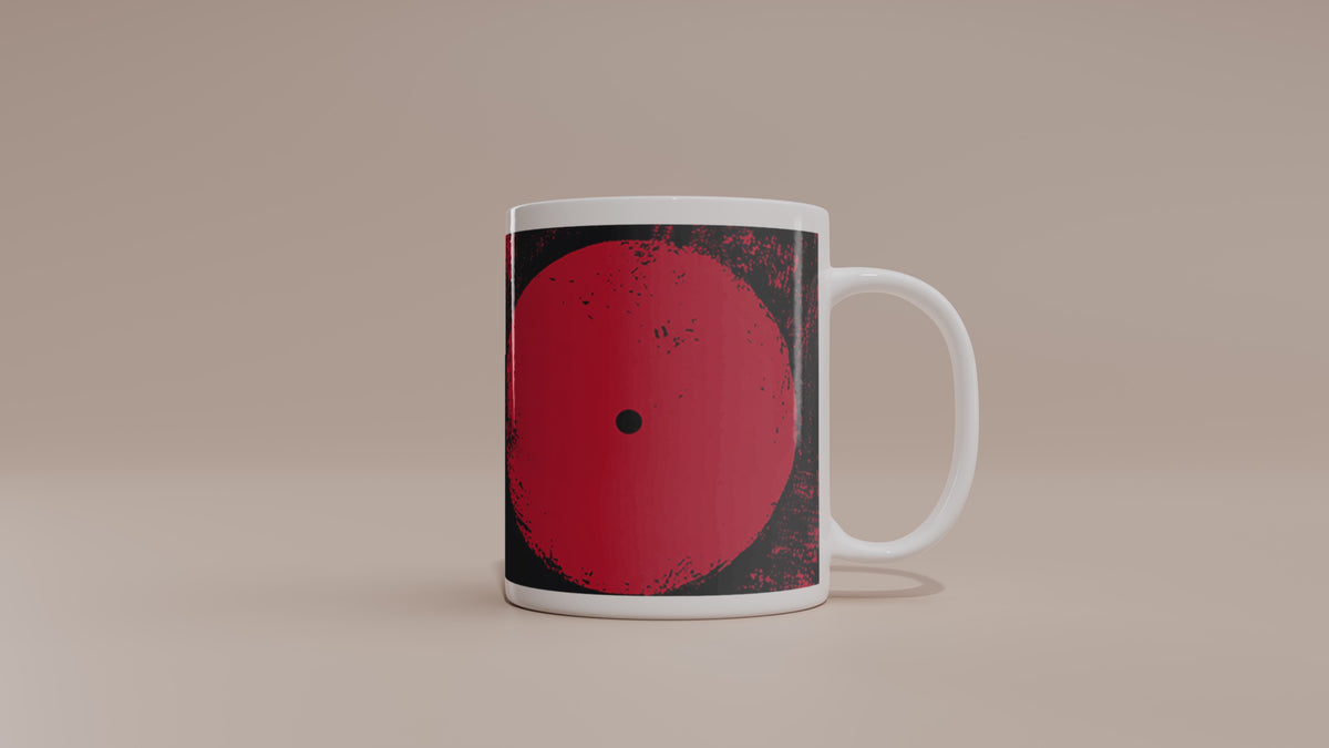 Video of 11 oz. red, black and cream abstract art coffee mug featuring bold geometric circles, stripes, organic shapes and a Bauhaus-inspired modern design.