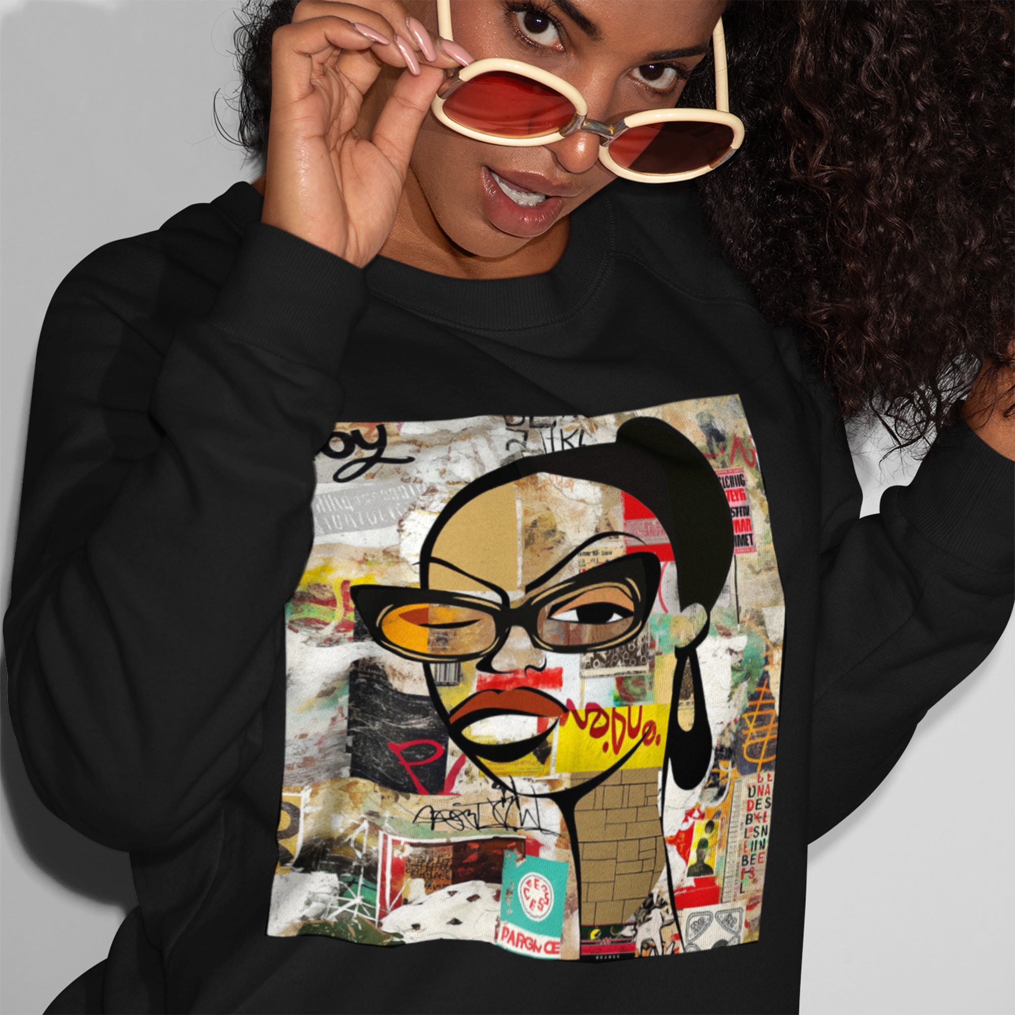 Boss Babe sweatshirt featuring an abstract cartoon Black girl named Markeisha in bold graffiti style, celebrating confidence, melanin, and empowerment.