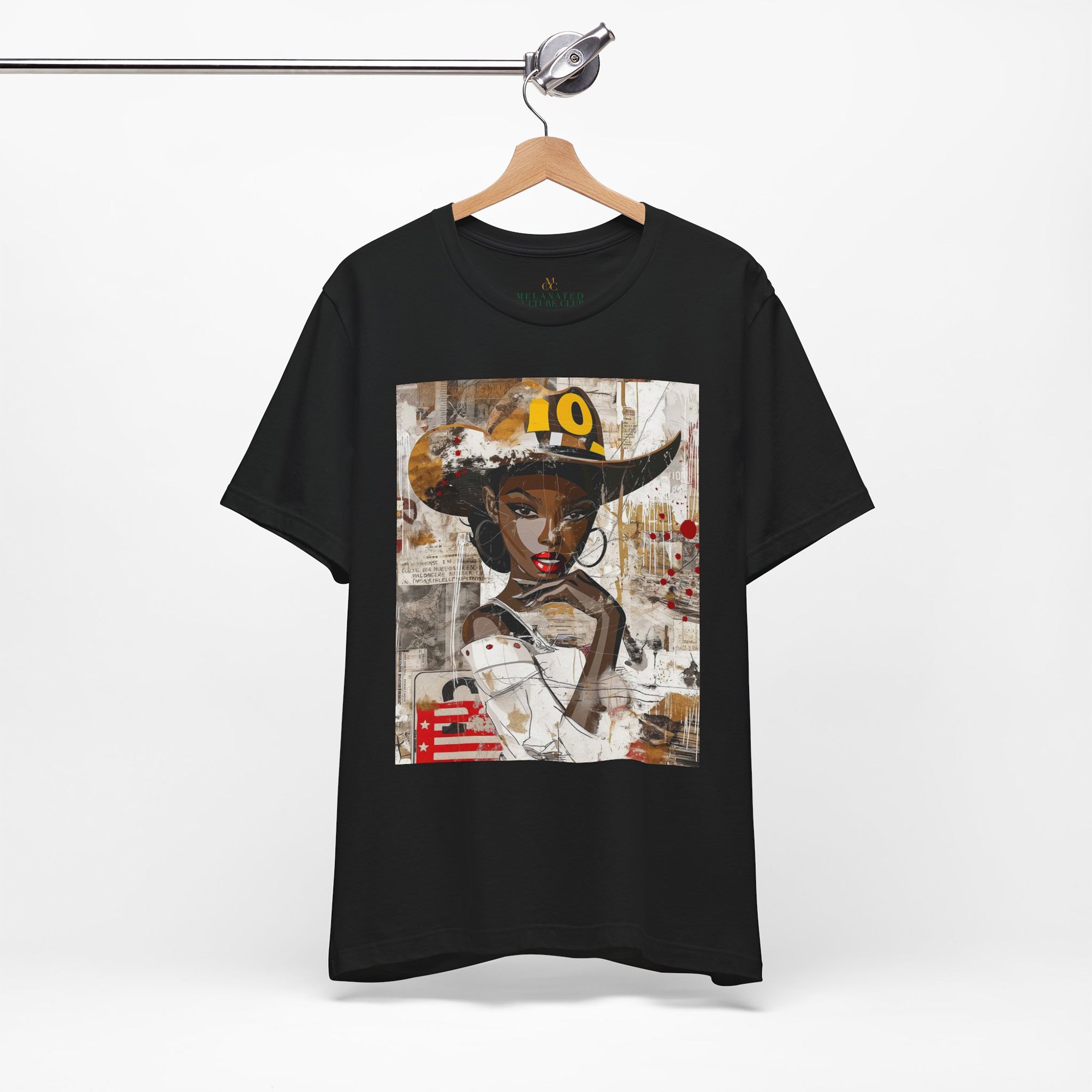 Black Cowgirl Tee featuring a cartoon-style brown skin girl in a graffiti-inspired pop art design. An edgy Afrocentric Western shirt celebrating African American culture and bold streetwear fashion.