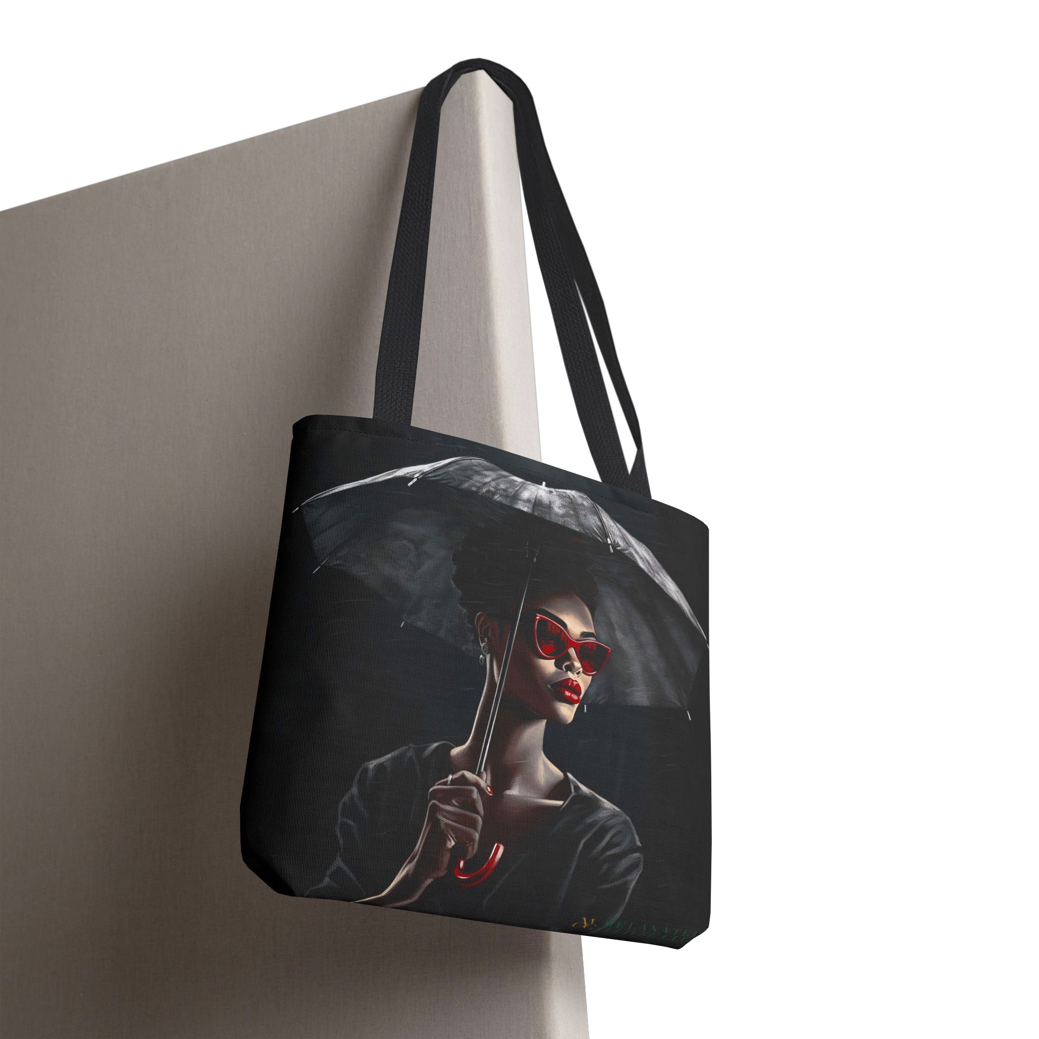 Black Woman Fashionista Tote Bag featuring a mysterious African American woman in trendy red sunglasses, holding a black umbrella in stormy weather. A stylish and glamorous accessory for fashion lovers.