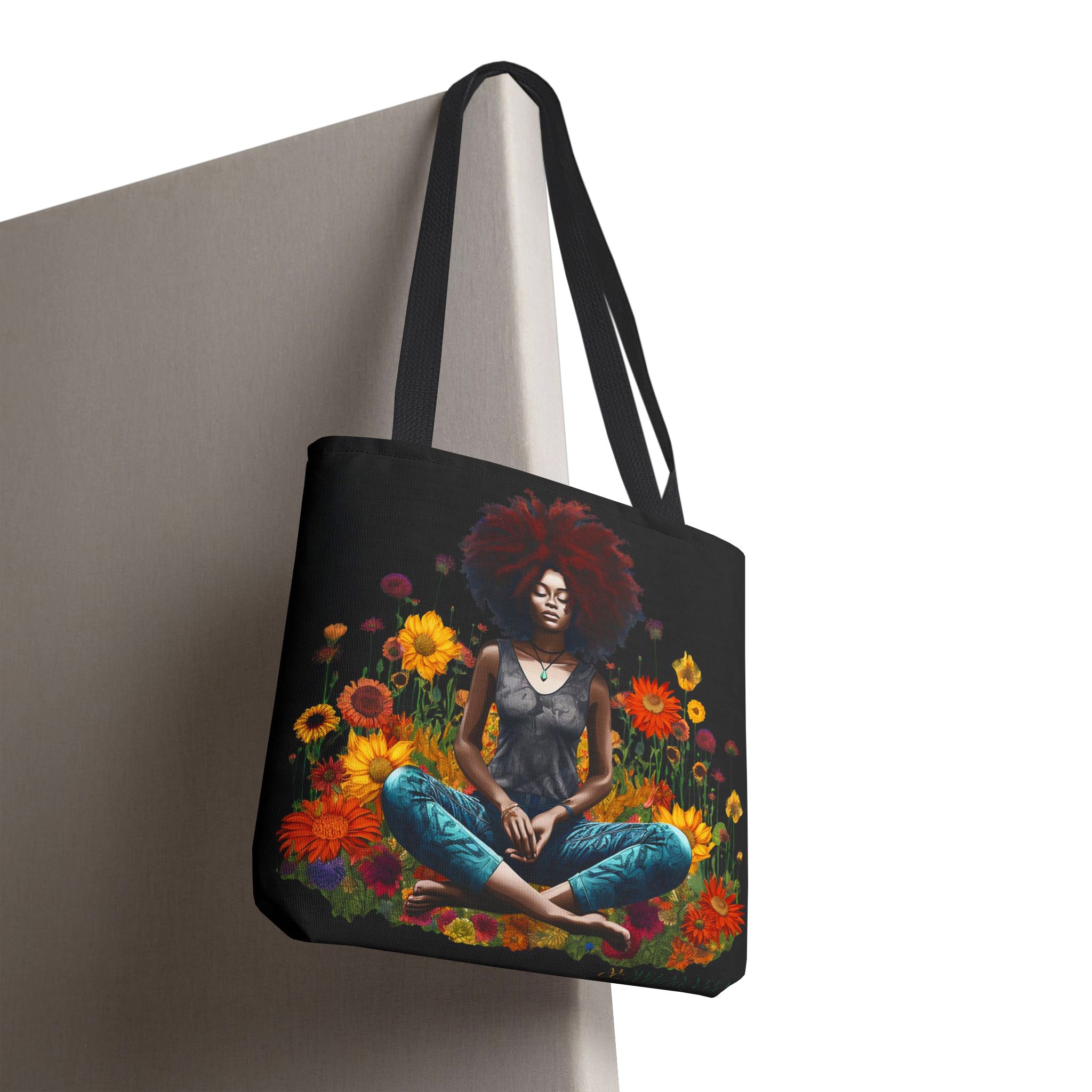 Find balance with the Black Woman Yoga Pose Tote Bag, featuring an African American woman practicing yoga in a wildflower field. A perfect carryall for yogis, wellness lovers, and self-care enthusiasts. 